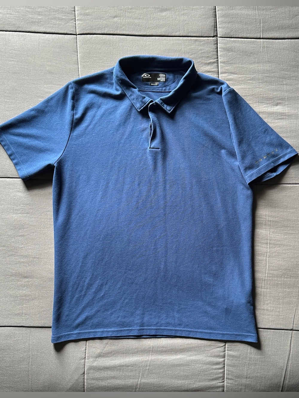 Oakley Navy Blue Men's Polo Shirt - Short Sleeve Performance Style